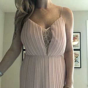 Floor length BCBGeberation pleated dress.